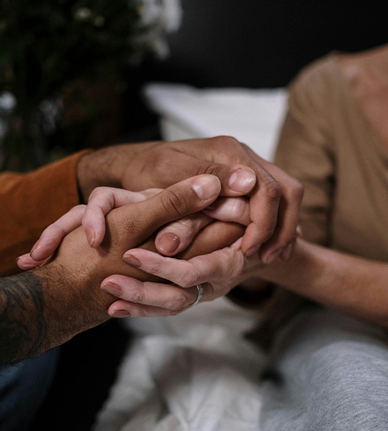 two people holding hands - helping